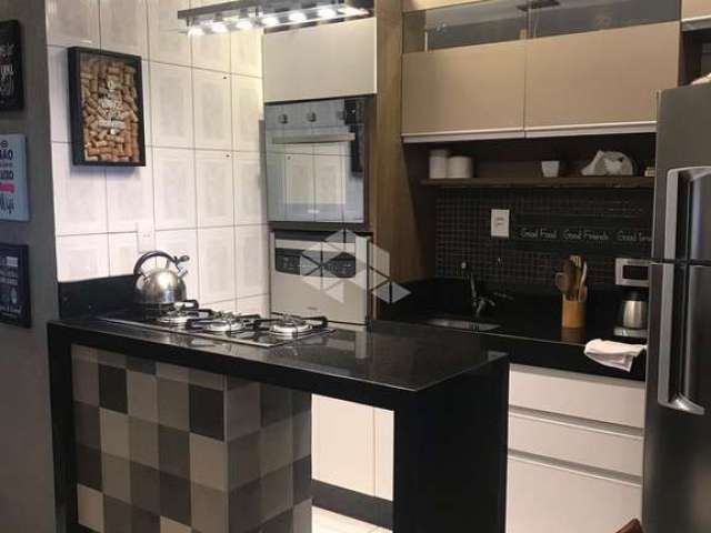 Apartamento de 1 dormitório, living amplo, cozinha americana, mobiliado, com box, na Zona Nova.