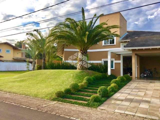 Casa de condomínio com 4 quartos à venda,  414 m²