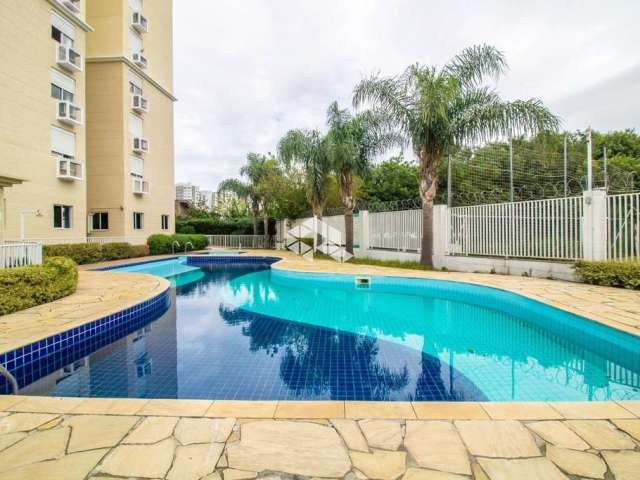 Excelente apartamento semi mobiliado de 02 dormitórios com 63 m² privativos e vaga coberta no bairro Passo da Areia em Porto Alegre