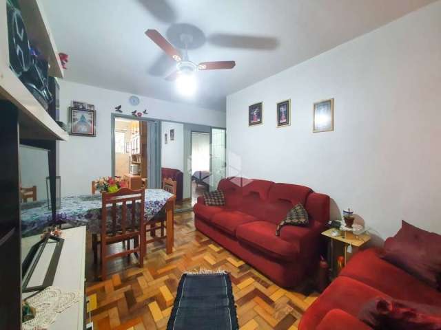 Apartamento térreo semimobiliado, 2 quartos/2 quartos/dormitórios,1 vaga coberta, a venda bairro Humaitá, Porto Alegre