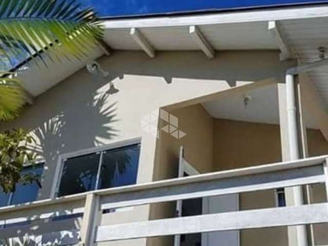 Casa com vista para o mar e morro Cambirela com 02 quartos garagem, pomar Palhoça/SC