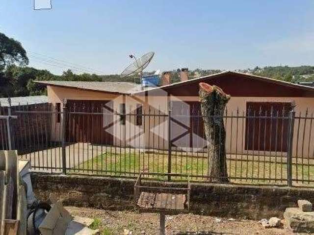 Casa com 110m², 3 dormitórios, 2 vagas de garagem no bairro Cinquentenário