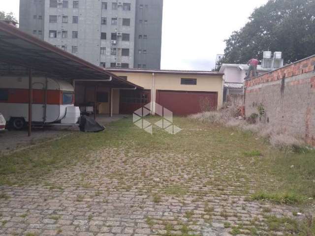 Terreno, estacionamento, oficina mecânica à venda no bairro Partenon - Porto Alegre/RS