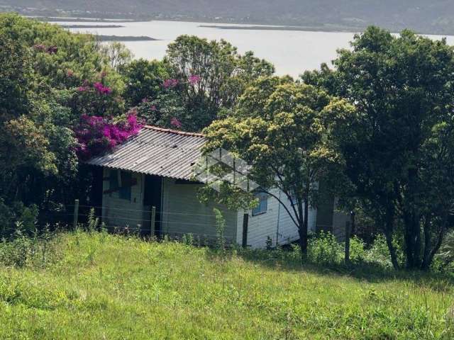 Terreno à venda em Garopaba com vista serra e  lagoa no Morro da Ferrugem.