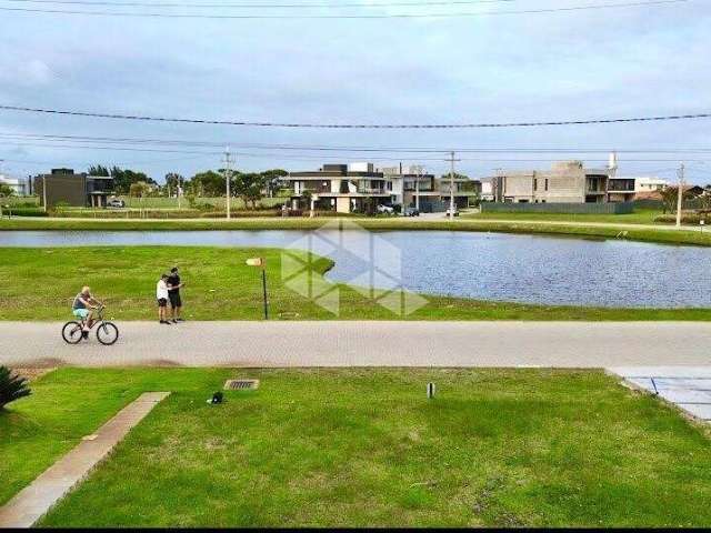 Lote frente lago no Condomínio Sunset em Xangri-lá