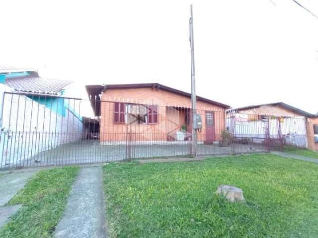 Casa 03 dormitórios para vender no bairro Santra Cruz em Gravataí.