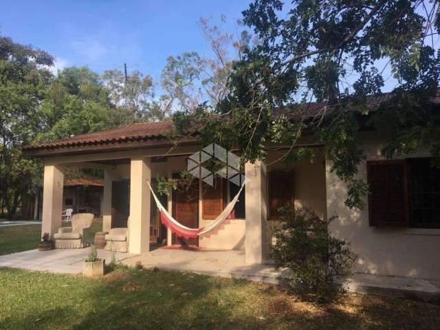 Sítio no Guaíba Country Clube - com Casa, Piscina e muita área arborizada - Parque Eldorado