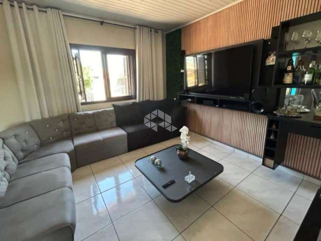 Casa 3 dormitórios, 2 banheiros no bairro Novo Esteio - Esteio/ RS