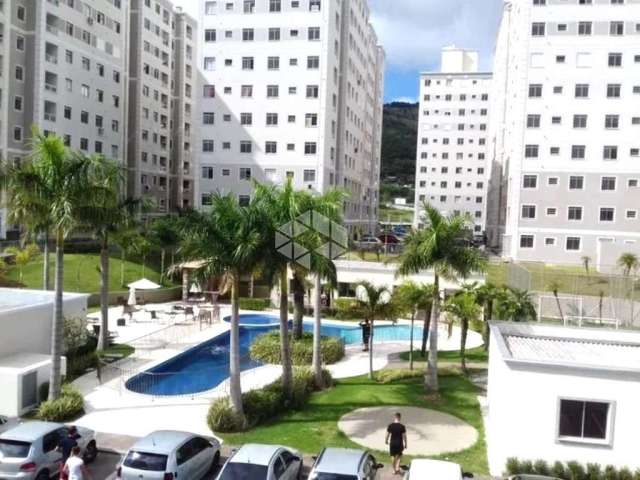 Apartamento à venda, Residencial Porto Cruzeiro, 48m² privativos, 1 vaga, 2 dormitórios e varanda com churrasqueira, bairro Morro Santana, Porto Alegr