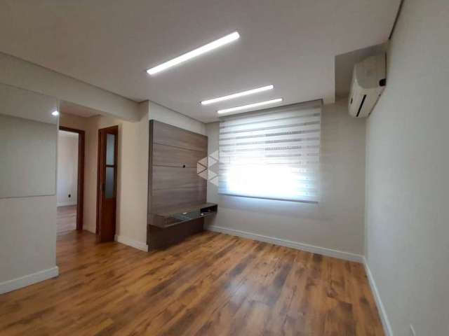 Apartamento 2 dormitórios, semimobiliado, no bairro Jardim Lindóia, em Porto Alegre. Aceita financiamento e FGTS.