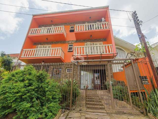 Casa 4 dorms à venda Rua Doutor Barbosa Gonçalves, Chácara das Pedras - Porto Alegre