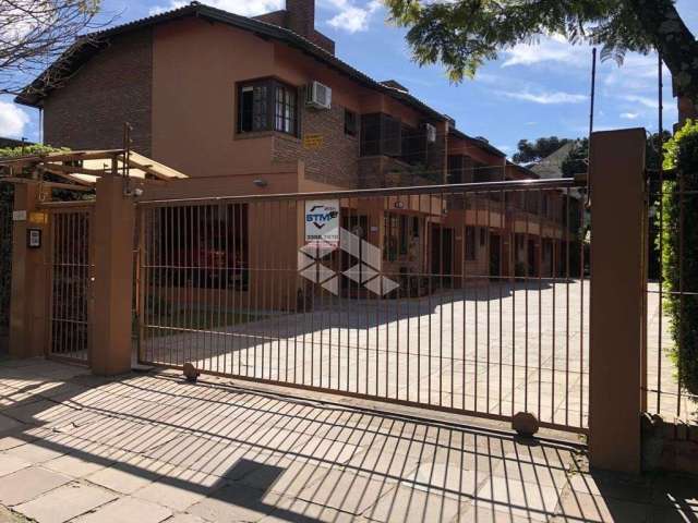 Casa em condomínio fechado com 3 quartos à venda na Avenida Coronel Marcos, 1608, Pedra Redonda, Porto Alegre, 174 m2 por R$ 900.000