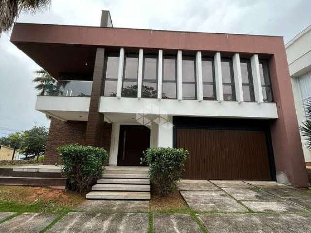 Casa com vista para o mar em condomínio fechado em Cacupé.