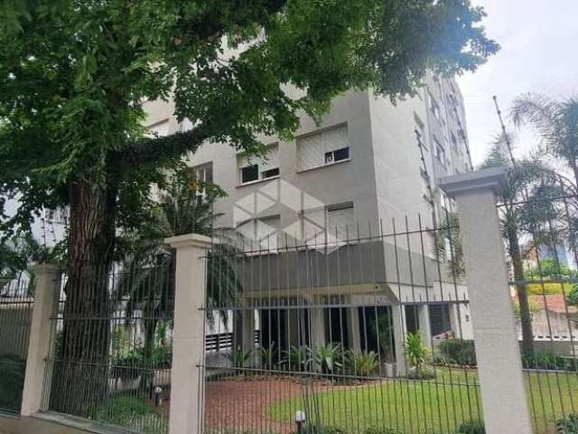 Excelente Apartamento amplo com 2 dormitórios, 2 banheiros, dependência completa, vaga coberta escriturada e muito sol