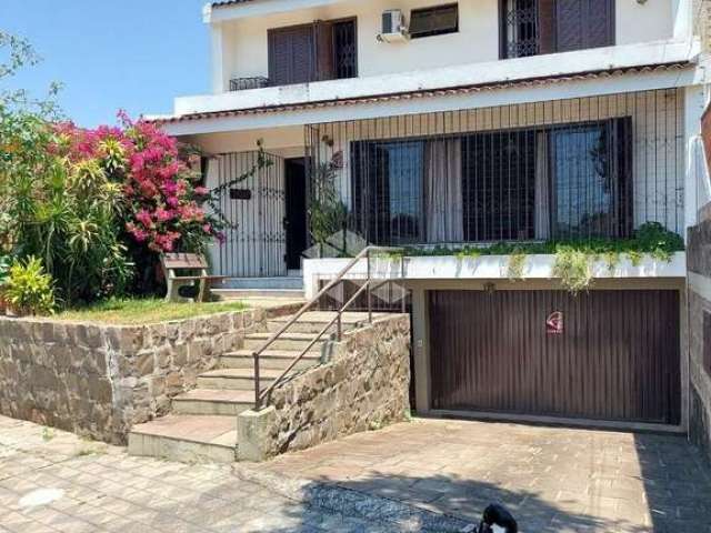 Casa com 4 quartos à venda na dos Cravos, 203, Patronato, Santa Maria, 247 m2 por R$ 990.000