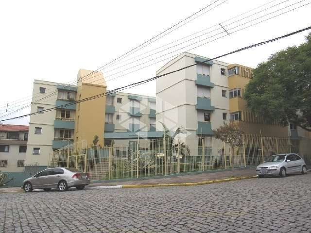 VENDO: Apartamento amplo com  dois quartos, e um box  de garagem no Pio X.