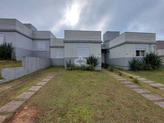 Casa em Condominio fechado de 2 dormitorios, sendo 1 suite, 1 vaga. Lomba do Pinheiro