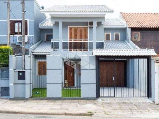 Casa de 3 dormitórios, no bairro Vila Nova, em Porto Alegre