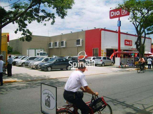 Galpão com área de estacionamento alugado para SUPERMERCADO  por R$ 40 mil /mês por 10 anos  à venda, por R$ 7.000.000 - Centro - Cruzeiro/SP