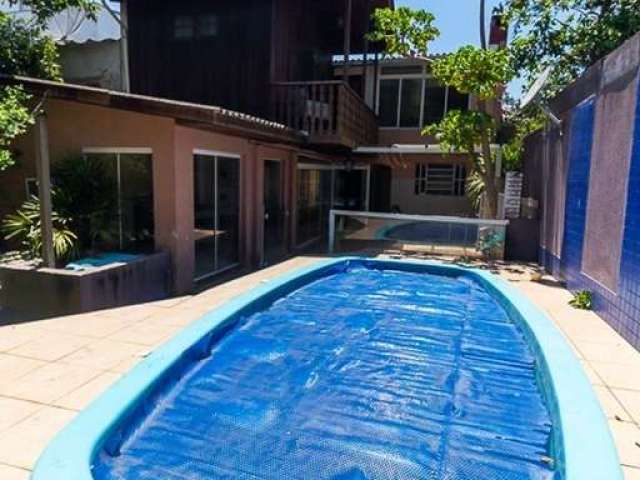 Casa em condomínio fechado com 4 quartos à venda na Coronel Feijó, 535, Higienópolis, Porto Alegre por R$ 1.100.000