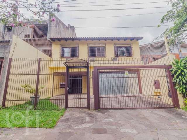 Casa com 4 quartos à venda na Rua João Paetzel, 751, Chácara das Pedras, Porto Alegre por R$ 1.450.000