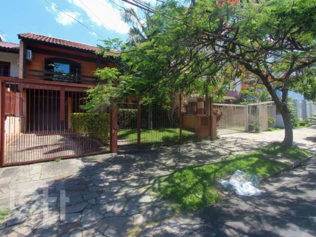 Casa com 5 quartos à venda na Rua Miracema, 287, Chácara das Pedras, Porto Alegre por R$ 1.700.000