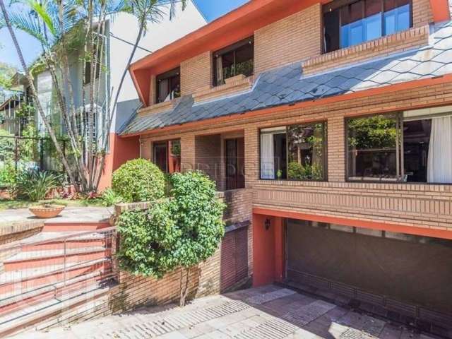 Casa com 4 quartos à venda na Avenida General Barreto Viana, 1024, Chácara das Pedras, Porto Alegre por R$ 1.699.000