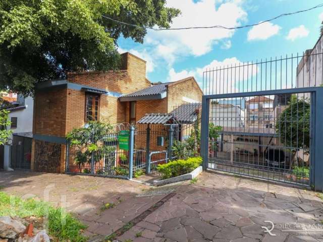 Casa em condomínio fechado com 3 quartos à venda na Avenida América, 268, Auxiliadora, Porto Alegre por R$ 1.400.000