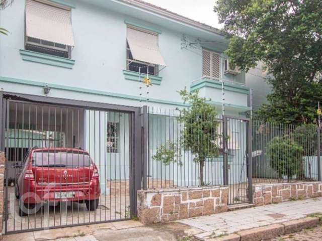 Casa em condomínio fechado com 4 quartos à venda na Rua Xavier Ferreira, 113, Auxiliadora, Porto Alegre por R$ 900.000