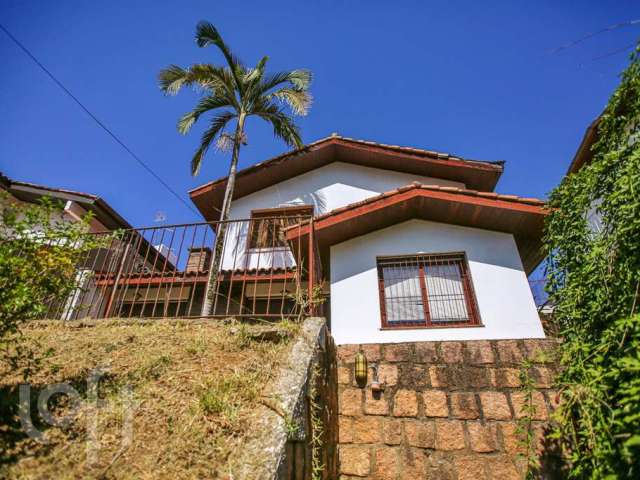 Casa com 4 quartos à venda na Rua Carlos Huber, 893, Três Figueiras, Porto Alegre por R$ 1.250.000