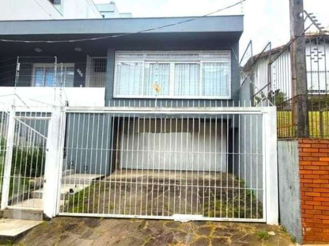 Casa com 3 quartos à venda na Rua Riveira, 542, Petrópolis, Porto Alegre por R$ 1.700.000