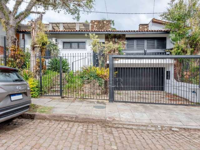 Casa com 4 quartos à venda na Rua Professor Fernando Carneiro, 102, Três Figueiras, Porto Alegre por R$ 1.450.000