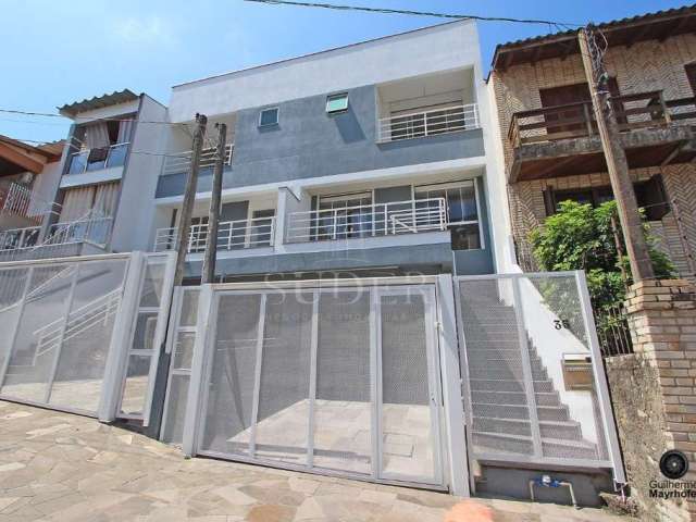 Casa com 3 quartos à venda na Rua Ivan Iglesias, 35, Jardim Itu Sabará, Porto Alegre por R$ 975.000