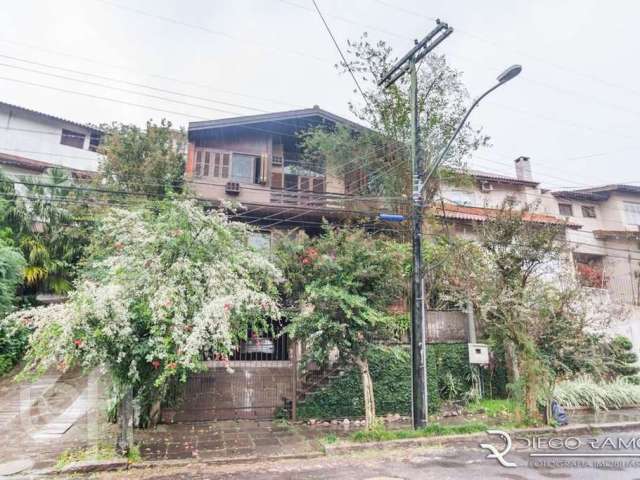 Casa com 4 quartos à venda na Rua Senador Annibal Di Primio Beck, 315, Boa Vista, Porto Alegre por R$ 1.180.000