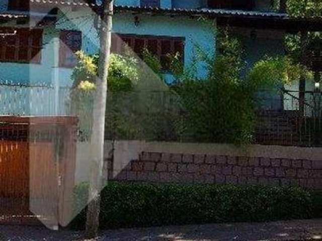 Casa em condomínio fechado com 3 quartos à venda na Rua Ramis Galvão, 283, Passo da Areia, Porto Alegre por R$ 900.000