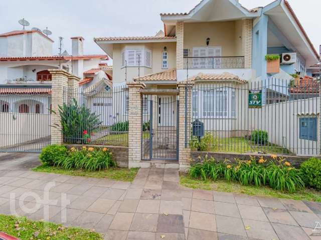 Casa com 4 quartos à venda na Avenida Doutor Sezefredo Azambuja Vieira, 162, Marechal Rondon, Canoas por R$ 2.100.000