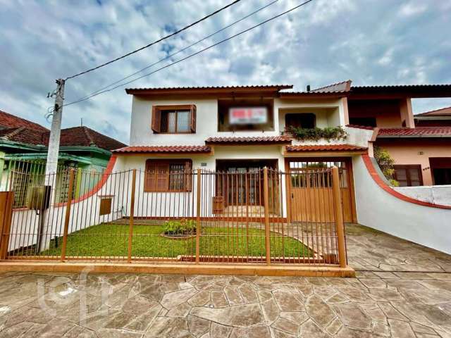 Casa com 3 quartos à venda na Beco Rui Barbosa, 469, Fátima, Canoas por R$ 940.000