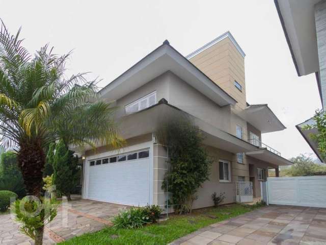 Casa em condomínio fechado com 4 quartos à venda na Rua Monte Castelo, 2007, Marechal Rondon, Canoas por R$ 3.300.000