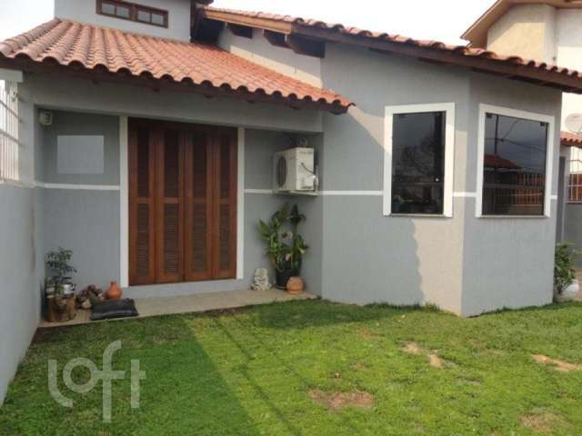 Casa em condomínio fechado com 3 quartos à venda na Rua Camboatás, 947, Igara, Canoas por R$ 654.000