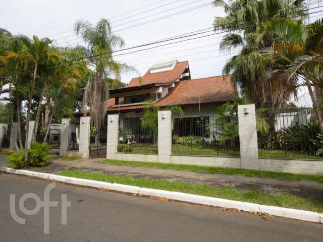 Casa com 4 quartos à venda na Rua Irmão Fernando Anatoli, 369, Marechal Rondon, Canoas por R$ 4.250.000