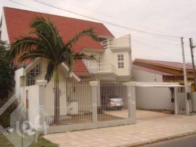 Casa em condomínio fechado com 4 quartos à venda na Rua Vereador Antônio Ferreira Alves, 615, Centro, Canoas por R$ 1.200.000