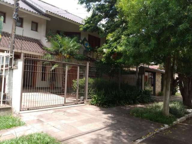 Casa em condomínio fechado com 3 quartos à venda na Rua Coronel Ricardo Machado, 79, Marechal Rondon, Canoas por R$ 1.472.500