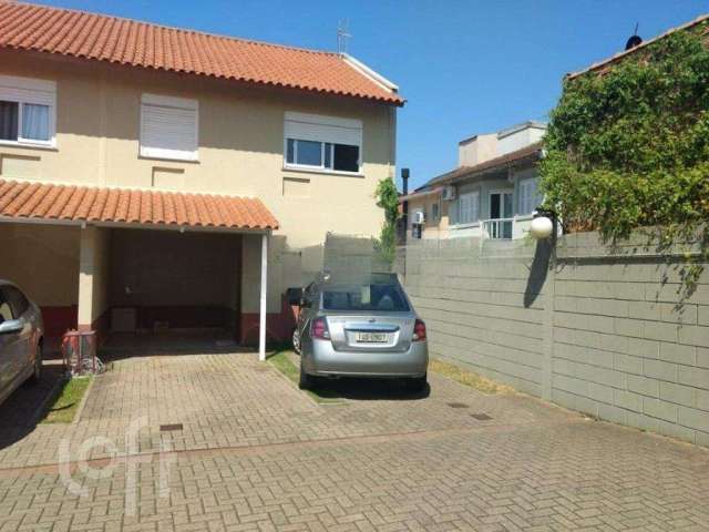 Casa em condomínio fechado com 3 quartos à venda na Rua República, 2708, Harmonia, Canoas por R$ 424.000