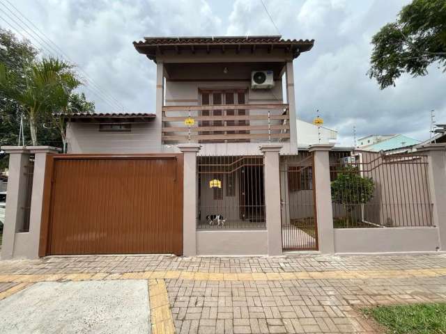 Casa em condomínio fechado com 3 quartos à venda na Rua Albani, 41, Mato Grande, Canoas por R$ 498.000