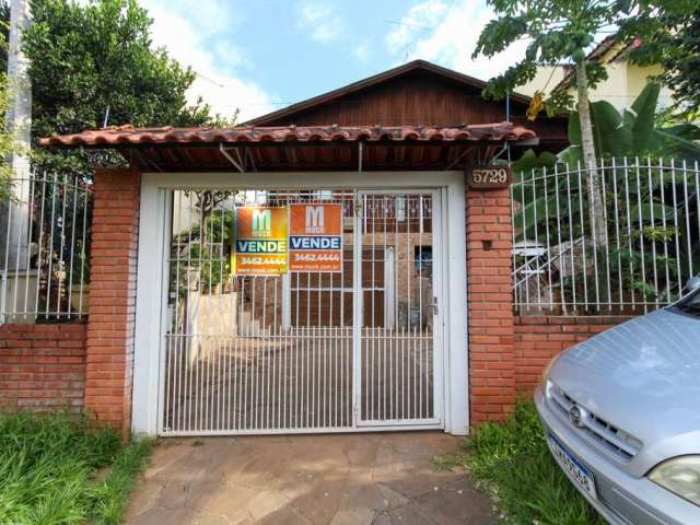 Casa com 4 quartos à venda na Avenida Doutor Sezefredo Azambuja Vieira, 5729, Olaria, Canoas por R$ 620.000