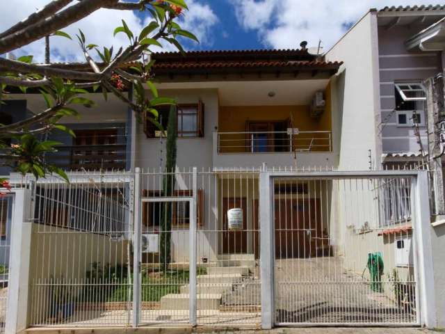 Casa em condomínio fechado com 3 quartos à venda na Rua Ilha Bela, 43, Estância Velha, Canoas por R$ 715.000