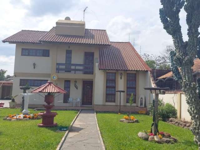 Casa com 6 quartos à venda na Rua Visconde de Taunay, 229, Harmonia, Canoas por R$ 1.350.000