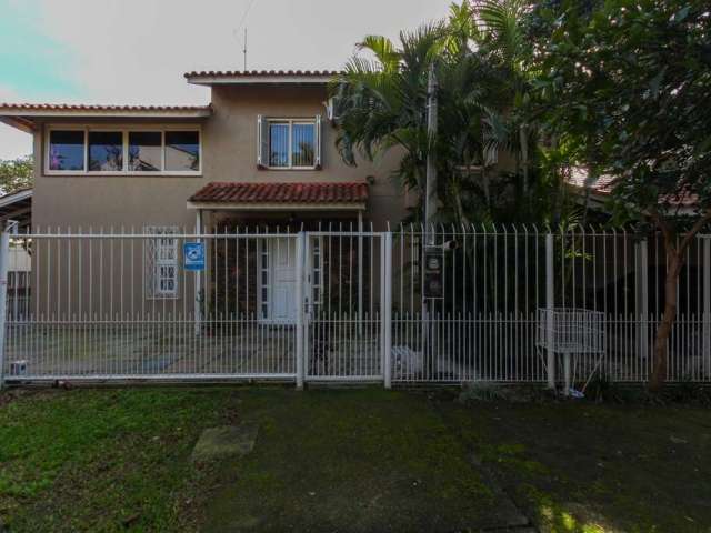 Casa com 4 quartos à venda na Rua das Pitangueiras, 164, Harmonia, Canoas por R$ 880.000