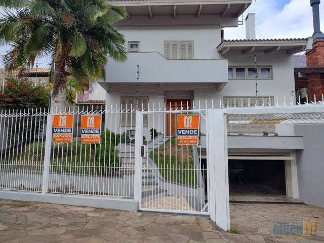 Casa com 4 quartos à venda na Rua Irmão Adão Rui, 401, Marechal Rondon, Canoas por R$ 1.750.000