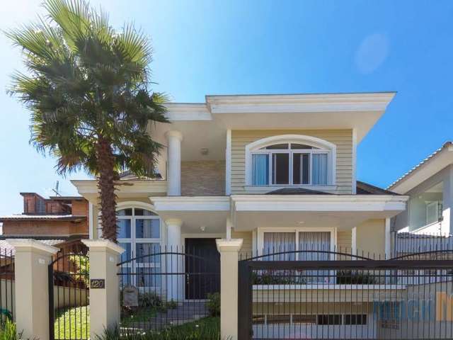 Casa com 4 quartos à venda na Rua Irmão Agnelo Chaves, 120, Marechal Rondon, Canoas por R$ 2.600.000